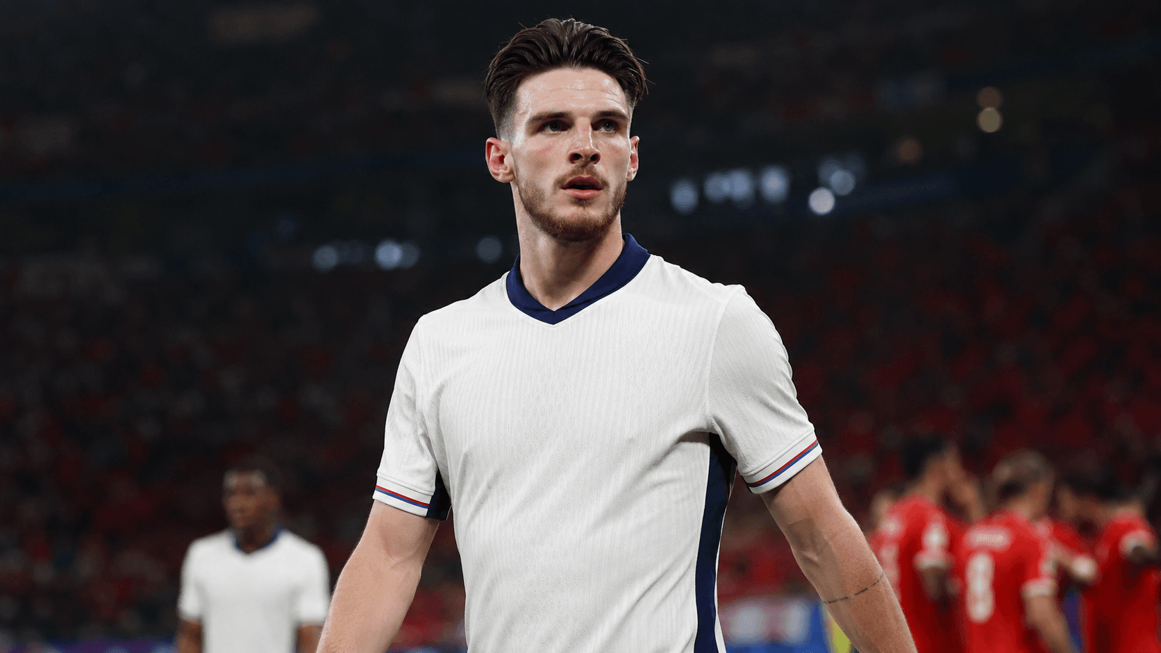 A dynamic shot of Declan Rice in an England kit,